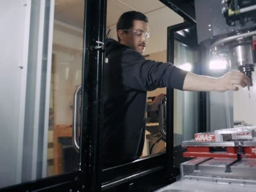 A Rockslice colleague checking the tooling in the workshop milling machine